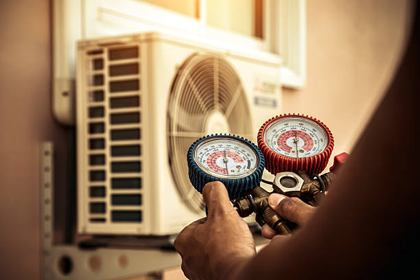 Professional Furnace Repair technician working in Hudson Falls, NY